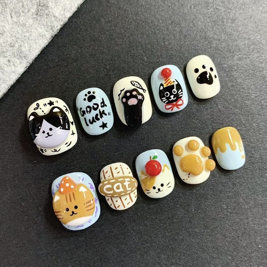 NailZagreb Cute Cartoon Cat Press On Nails with Kawaii Paw and Lucky Charm Design
