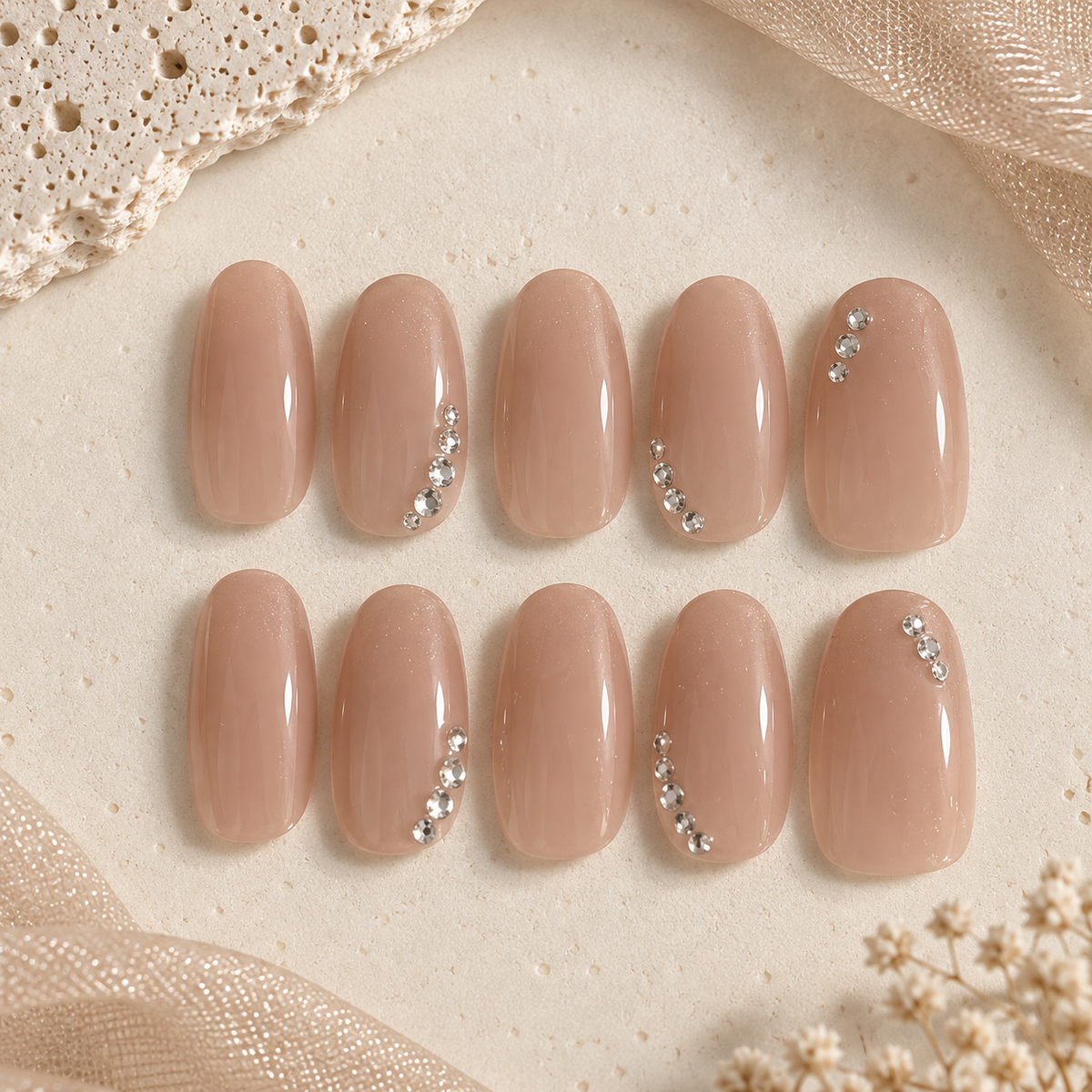 NailZagreb Glossy Nude Almond Press On Nails with Silver Rhinestone Details for Elegant Everyday Looks