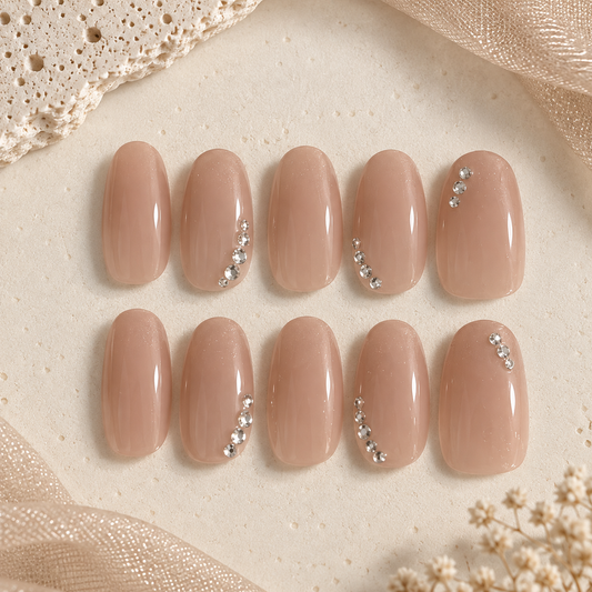 NailZagreb Glossy Nude Almond Press On Nails with Silver Rhinestone Details for Elegant Everyday Looks