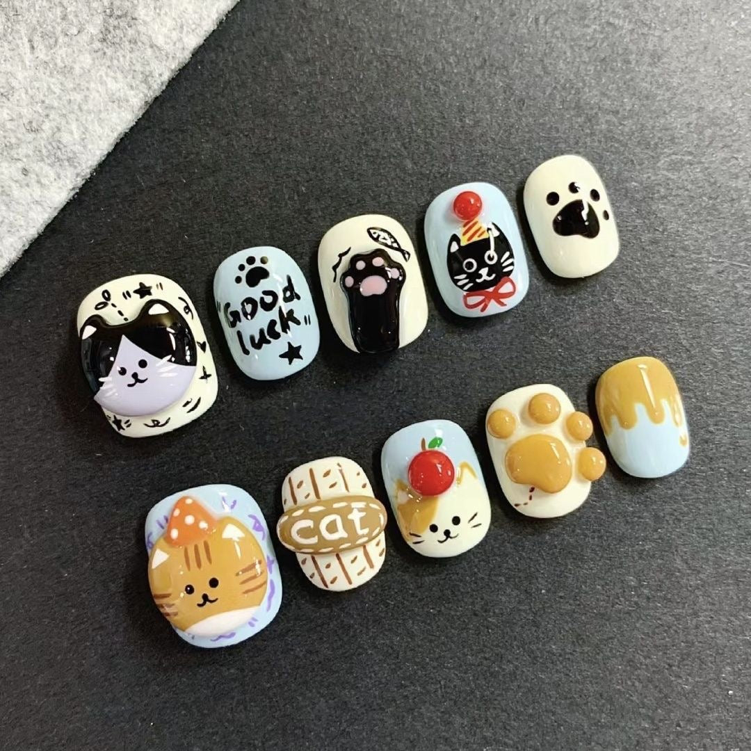 NailZagreb Cute Cartoon Cat Press On Nails with Kawaii Paw and Lucky Charm Design
